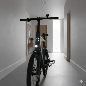 Close-up of an ebike with folding handlebars and pedals to create a slim profile for storage in narrow corridors.