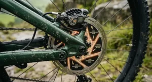 Alt text for a detailed view of the adjustable rear air shock and pivot points on a full suspension electric bike illustrating the mechanical travel.