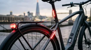 Diagram comparing the sleek look of electric bikes with built-in lights versus traditional clip-on battery lights.