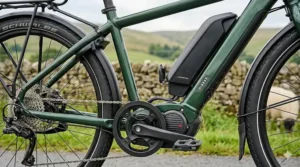 Close-up of the high-torque mid-drive motor on an electric tandem bike.