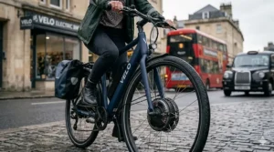 Side view of an electric bicycle featuring a front hub motor, ideal for smooth city riding.