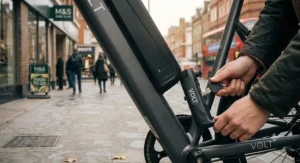 Illustration showing the step-by-step installation of a battery security lock on an ebike.