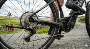 Close-up of a mid-drive motor on an e-bike, highlighting power for steep inclines.