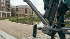 A close-up of the discreet motor system on a sleek sub 15kg electric bike.