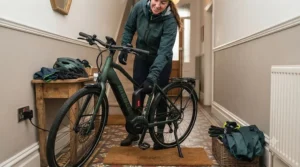 Plugging in a battery pack for a pedal-assist electric bike used for daily fitness and recreation.