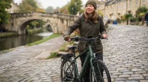Demonstrating safe posture while using walk mode to guide an electric bike.