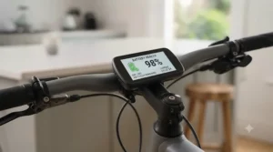 Handlebar-mounted digital display showing 98% battery health and remaining charge cycles.