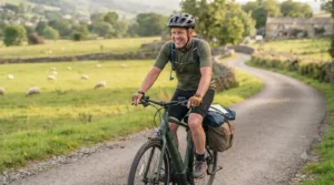 Cyclist enjoying a scenic weekend ride, demonstrating the comfort of long distance sitting on a modern e-bike.
