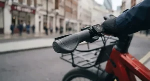 Close-up detail of ergonomic memory foam handlebar grips fitted to an electric bike.