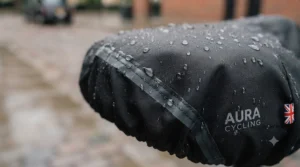Detailed view of reinforced, double-stitched and taped seams on a high-performance electric bike rain cover.