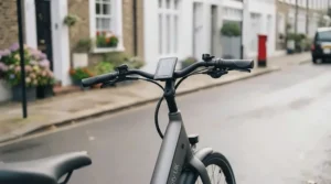 A family-friendly electric bike equipped with a rear cargo rack and a protective child seat with a wrap-around backrest.