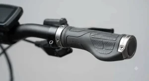 Detail view of aluminium lock-rings securing high-density rubber ergonomic grips onto urban electric bike bars.